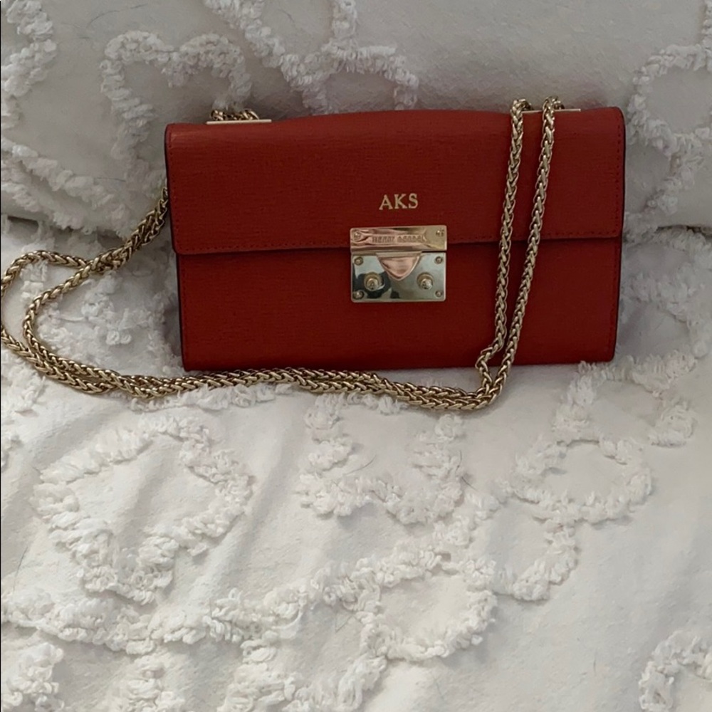 Henri Bendel wallet on a chain.